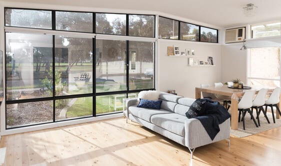 Meier Paul Real Estate. Real Estate Agent Home Page. Picture of home living room shot looking through to the front garden.