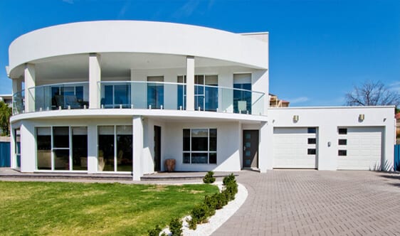 Meier Paul Real Estate. Real Estate Agent Home Page. Picture of beautiful two story house by the beach.